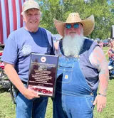 Keith Sieverding reviewing the Randy L. Holt Memorial Award of Excellence
